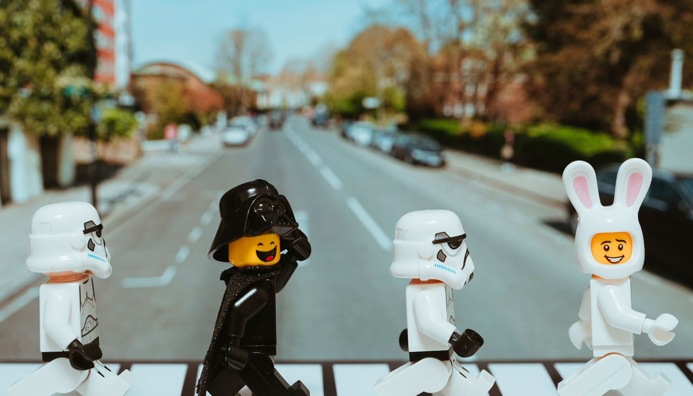 LEGO Star Wars characters walking across the street