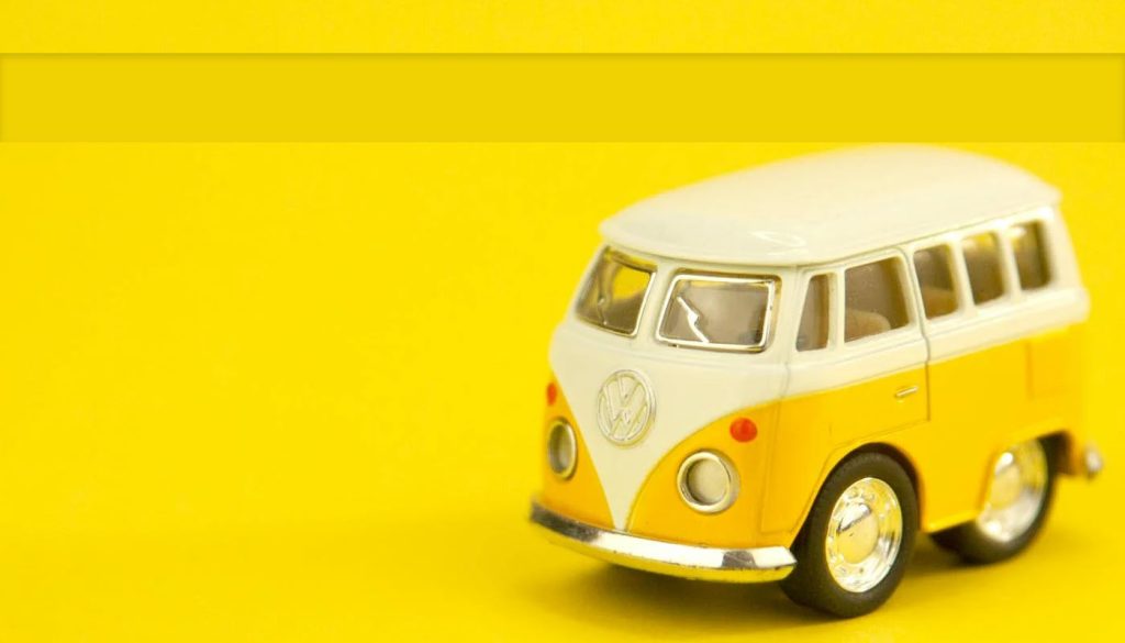 Old Vintage Van Toy, Yellow Background